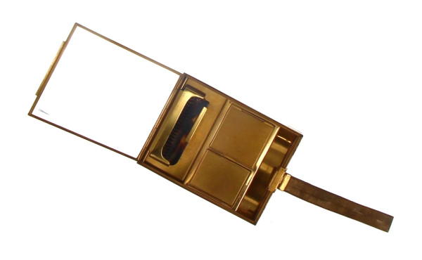 Minaudière en métal doré, formant nécess
