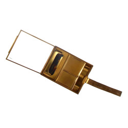 Minaudière en métal doré, formant nécess