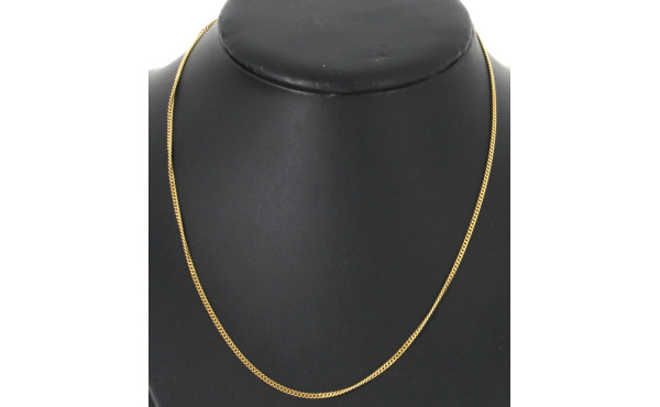 Chaîne en or jaune 18 cts, poinçon tête 