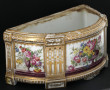 JARDINIÈRE de forme demi-lune en porcela