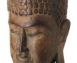 Tête de Bouddha sculptée dans un bois ex