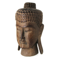 Tête de Bouddha sculptée dans un bois ex