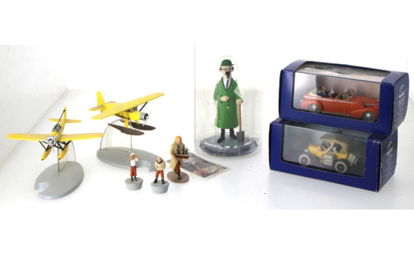 TINTIN - Lot comprenant une figurine sou