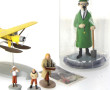 TINTIN - Lot comprenant une figurine sou