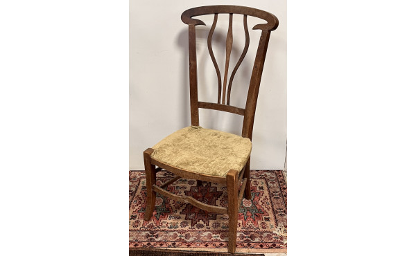 Chaise circa 1900 en bois sculpté, dossi