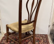 Chaise circa 1900 en bois sculpté, dossi