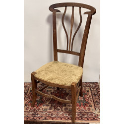 Chaise circa 1900 en bois sculpté, dossi