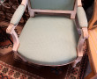 Deux fauteuils de style Louis XVI, en bo