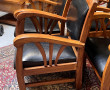 Suite de 4 fauteuils en bois exotique, a