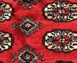 Grand tapis en laine points noués à fond