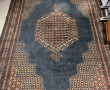 Grand tapis en laine points noués à fond