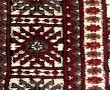 Tapis en laine dans les tons beige et ro
