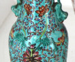 Paire de vases en porcelaine décor flora
