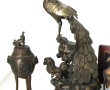 Lot comprenant un brûle parfum en métal 