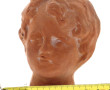 "Tête d'enfant", sujet en terre cuite, n