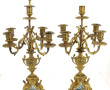 Paire de candélabres en métal doré et pl