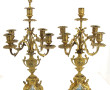 Paire de candélabres en métal doré et pl