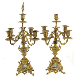 Paire de candélabres en métal doré et pl