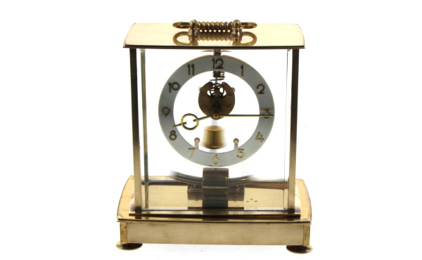 Pendule squelette en laiton, mouvement é