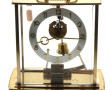 Pendule squelette en laiton, mouvement é
