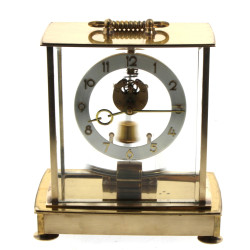 Pendule squelette en laiton, mouvement é