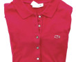 LACOSTE - Polo femme framboise taille 40