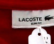 LACOSTE - Polo femme framboise taille 40