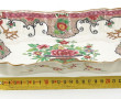 Petit plat creux en porcelaine à décor f