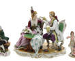 Couple galant attablé, sujet en porcelai