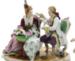 Couple galant attablé, sujet en porcelai