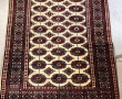 Tapis en laine dans les tons beige et ro