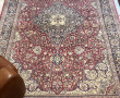 Tapis en laine dans les tons rouges, ble