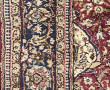 Tapis en laine dans les tons rouges, ble