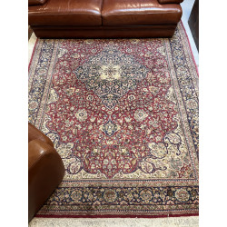 Tapis en laine dans les tons rouges, ble