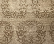 Tapis en laine dans les tons beige et br