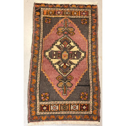 Petit tapis en laine points noués dans l