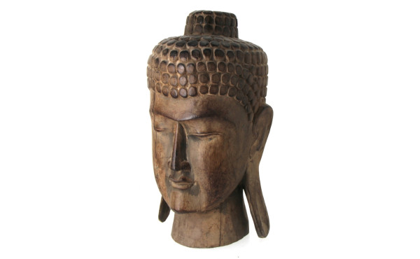 Tête de Bouddha sculptée dans un bois ex