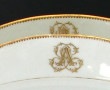 Paire de plats de forme ovale en porcela