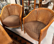 Paire de fauteuils en bois clair et cann