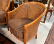 Paire de fauteuils en bois clair et cann