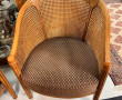 Paire de fauteuils en bois clair et cann