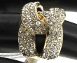 Bague fantaisie en métal et strass blanc