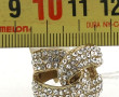 Bague fantaisie en métal et strass blanc
