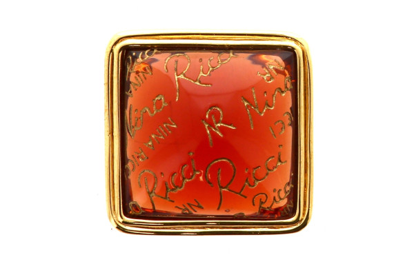 NINA RICCI - Broche en métal doré et rés