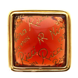 NINA RICCI - Broche en métal doré et rés