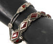 Deux bracelets en argent dont l'un portr