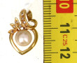 Pendentif en or jaune 18 cts, perle de c