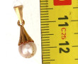 Pendentif perle de culture, monture en o