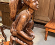 Homme assis, bois sculpté, travail de Ma
