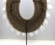 Collier pectoral en coquillages dans l'
